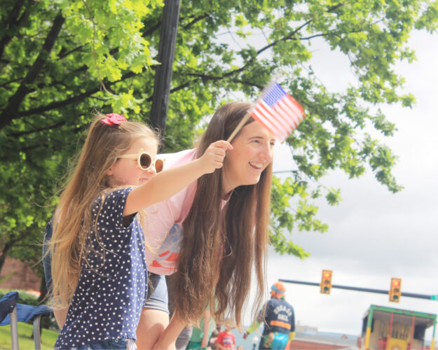 Show of support: Crowds gather downtown for Memorial Day parade